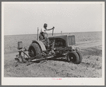 Tractor on large farm near Ralls, Texas