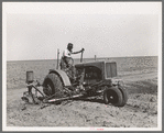 Tractor on large farm near Ralls, Texas