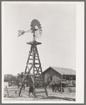 Windmill, watering trough and barn on SMS Ranch near Spur, Texas