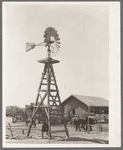 Windmill, watering trough and barn on SMS Ranch near Spur, Texas