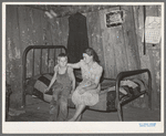 Daughter and son of agricultural day laborer living near Webbers Falls, Oklahoma. The furnishings of this shack were meager and broken and filthy. Muskogee County