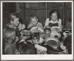 Children of agricultural day laborer eating their noonday meal near Webbers Falls, Oklahoma. Muskogee County