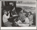 Migrant steeple-jack and his family eating a "bought lunch" by the roadside Near Prague, Oklahoma, Lincoln County