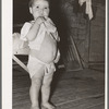 Child of tenant farmer. Notice distended stomach, indicative of malnutrition. Near Warner, Oklahoma