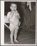 Child of tenant farmer. Notice distended stomach, indicative of malnutrition. Near Warner, Oklahoma