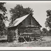 Home of migrant agricultural workers who have returned to Oklahoma from the west. They are looking for field work. McIntosh County, Oklahoma