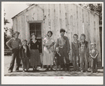 Family of agricultural day laborer, former oil worker and coal miner. The family lives in this two-room shack in McIntosh County, Oklahoma