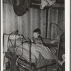 Corner of bedroom of home of agricultural day laborer. McIntosh County, Oklahoma