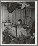 Corner of bedroom of home of agricultural day laborer. McIntosh County, Oklahoma
