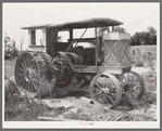 Old steam tractor on farm of Indian in McIntosh County, Oklahoma