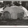 Covered wagon trailer home of migrant from Texas near Tullahassee, Oklahoma. Wagoner County