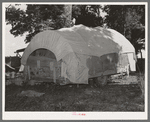 Covered wagon trailer home of migrant from Texas near Tullahassee, Oklahoma. Wagoner County