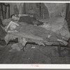 Sons of agricultural day laborer taking a nap. McIntosh County, Oklahoma