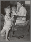 Wife of agricultural day laborer and her children near Tullahassee, Oklahoma. Wagoner County