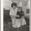 Woman living with agricultural day laborer's family who cared for his wife and two children. Poteau Creek near Spiro, Oklahoma