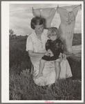 Woman living with agricultural day laborer's family who cared for his wife and two children. Poteau Creek near Spiro, Oklahoma