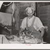 Worker at feed mill. Taylor, Texas