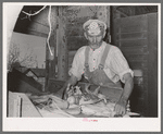 Worker at feed mill. Taylor, Texas