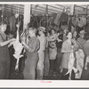 Picking turkeys at cooperative poultry house. Brownwood, Texas
