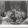 Unloading carload of flour. Wholesale grocery, San Angelo, Texas