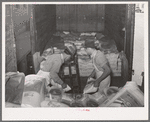 Unloading carload of flour. Wholesale grocery, San Angelo, Texas