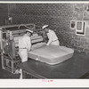 Filling mattress case with cotton linters. Mattress factory. San Angelo, Texas