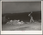 Son of Pomp Hall chopping wood in the early dawn. Creek County, Oklahoma. See general caption number 23