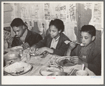 Children of Pomp Hall, Negro tenant farmer, eating their supper. For supper the family had corn bread, peas, gravy, rice, fried bacon and turnips. See general caption number 23. Creek County, Oklahoma