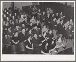 Jaycee members and their wives listening to the program which followed supper. Eufaula, Oklahoma. See general caption number 25