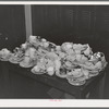 Dirty dishes after Jaycees' supper at high school. Eufaula, Oklahoma. See general caption number 25