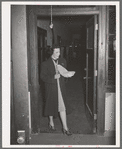 Wife of Jaycee member bringing food to the buffet supper at the high school. Eufaula, Oklahoma. See general caption 25