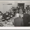Jaycee members and their wives at buffet supper at the high school. Eufaula, Oklahoma. See general caption number 25