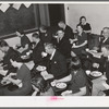 Jaycee members and their wives at buffet supper at the high school. Eufaula, Oklahoma. See general caption number 25