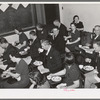 Jaycee members and their wives at buffet supper at the high school. Eufaula, Oklahoma. See general caption number 25