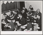 Jaycee members and their wives at buffet supper at the high school. Eufaula, Oklahoma. See general caption number 25