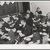 Jaycee members and their wives at buffet supper at the high school. Eufaula, Oklahoma. See general caption number 25