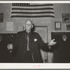Colonel Lilly, auctioneer at pie supper. McIntosh County, Oklahoma. See general caption number 24