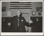 Colonel Lilly, auctioneer at pie supper. McIntosh County, Oklahoma. See general caption number 24
