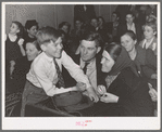 Farm couple with their son at pie supper. McIntosh County, Oklahoma. See general caption number 24