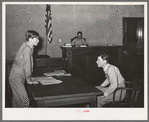 Scene from a one-act play presented at county meeting of 4-H Club. This play was in the form of a trial of Farmer Brown who was charged with cruelty to his farm. Eufaula, Oklahoma