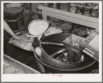 Centrifugal machine for forming dough into shape for rolls. Bakery, San Angelo, Texas