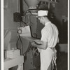 Looking over the order list for baking. Bakery, San Angelo, Texas