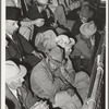 Spectators at livestock auction. San Angelo, Texas