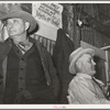 Auctioneer (right) and an official (left) at livestock auction. San Angelo, Texas