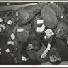 Cases which are used for insulation on ice cream cans. Creamery, San Angelo, Texas