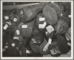 Cases which are used for insulation on ice cream cans. Creamery, San Angelo, Texas