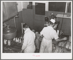 Bottling milk at creamery. San Angelo, Texas