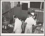 Bottling milk at creamery. San Angelo, Texas
