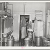 Room where milk is strained and cooled. Large dairy in Tom Green County, Texas