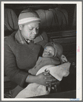Negro mother and child at local chapter meeting of UCAPAWA (United Cannery, Agricultural, Packing, and Allied Workers of America). Bristow, Oklahoma